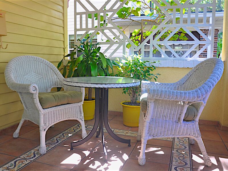 Have lunch on the front porch at the wicker chairs and table seating area